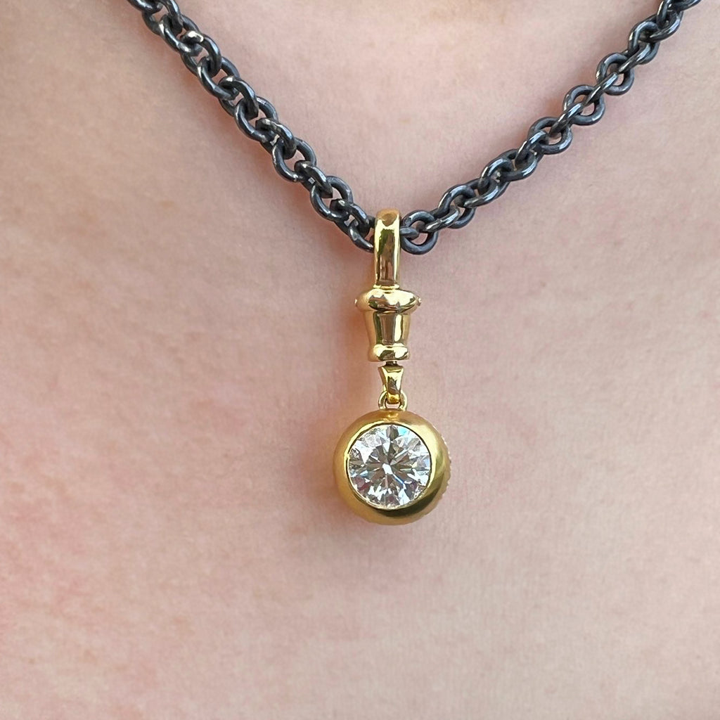 Photograph 4 of Sam Lafford's 18k Yellow Gold An Grá Diamond Necklace. Available on DESIGNYARD.com and in our Contemporary Jewellery Shop Dublin, Ireland. Free Worldwide Shipping with DHL.