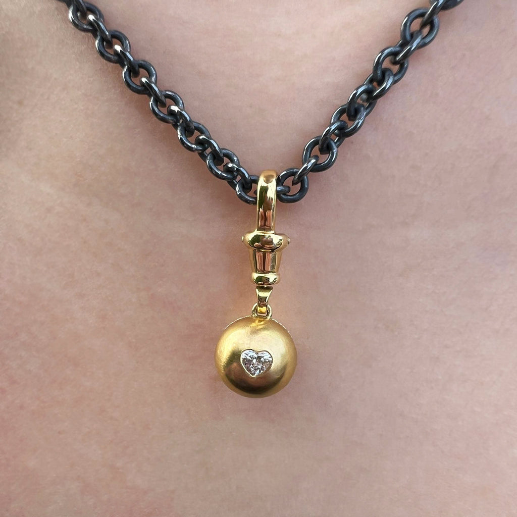 Photograph 6 of Sam Lafford's 18k Yellow Gold An Grá Diamond Necklace. Available on DESIGNYARD.com and in our Contemporary Jewellery Shop Dublin, Ireland. Free Worldwide Shipping with DHL.