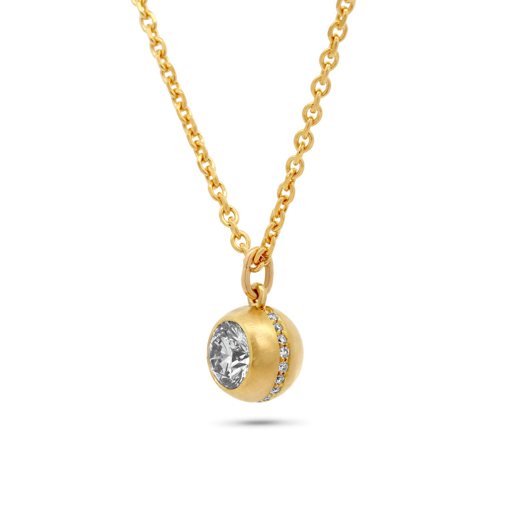 Photograph 2 of Sam Lafford's 18k Yellow Gold An Grá Diamond Pendant. Available on DESIGNYARD.com and in our Contemporary Jewellery Shop Dublin, Ireland. Number 1 for Contemporary Jewellery.
