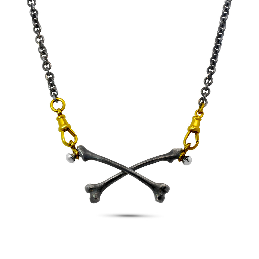 sam lafford 18k yellow gold oxidised silver crossbones necklace designyard contemporary jewellery gallery dublin ireland 