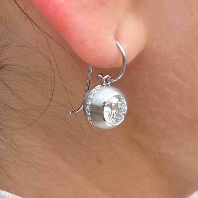 Photograph 1 of Sam Lafford's Platinum An Grá Diamond Earrings. Available on DESIGNYARD.com and in our Contemporary Jewellery Shop Dublin, Ireland. Free Worldwide Shipping with DHL.