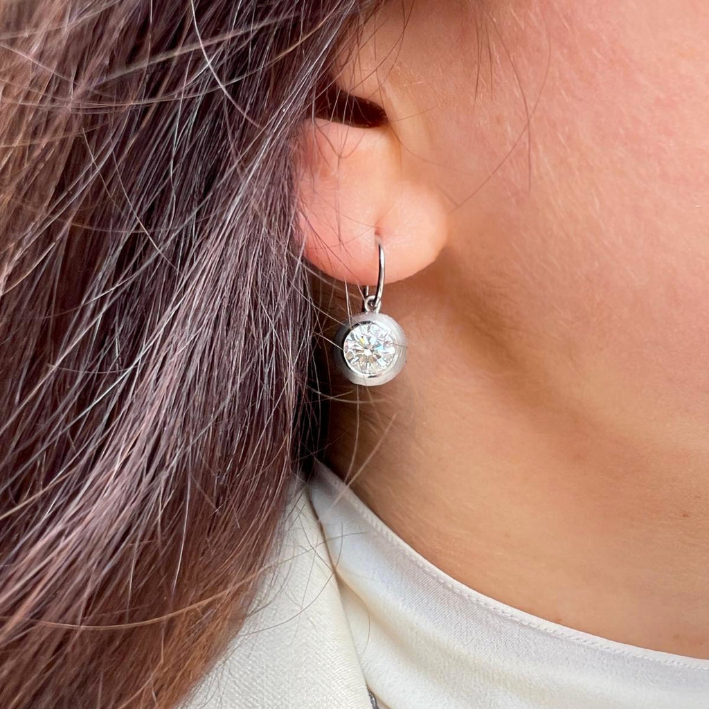 Photograph 3 of Sam Lafford's Platinum An Grá Diamond Earrings. Available on DESIGNYARD.com and in our Contemporary Jewellery Shop Dublin, Ireland. Free Worldwide Shipping with DHL.