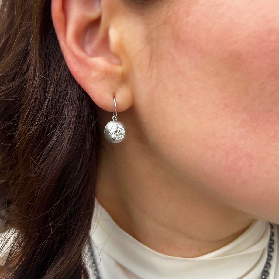 Photograph 4 of Sam Lafford's Platinum An Grá Diamond Earrings. Available on DESIGNYARD.com and in our Contemporary Jewellery Shop Dublin, Ireland. Free Worldwide Shipping with DHL.