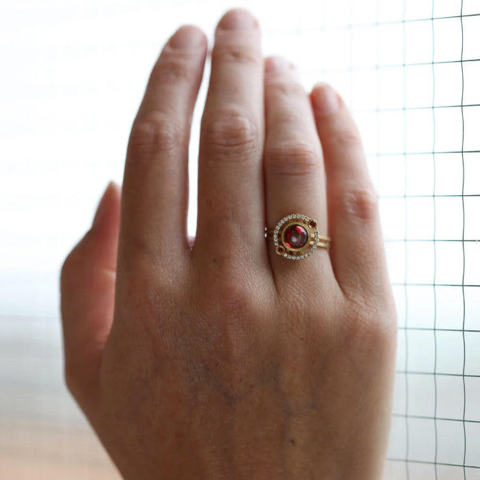 Photograph 2 of Shimell and Madden's 18k Yellow Gold Hemi Nova Garnet Orange Sapphire Diamond Engagement Ring. Available on DESIGNYARD.com and in our Jewellery Shop Dublin, Ireland. Free Worldwide Shipping with DHL.
