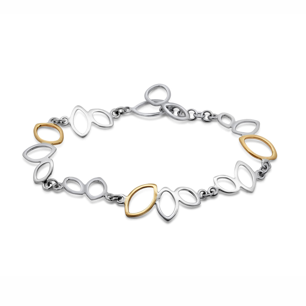 Photograph 1 of Stephanie Robinson's Sterling Silver & 14k Yellow Gold Falling Leaves Bracelet. Available on DESIGNYARD.com and in our Contemporary Jewellery Shop Dublin, Ireland. #1 for Jewellery in Ireland.