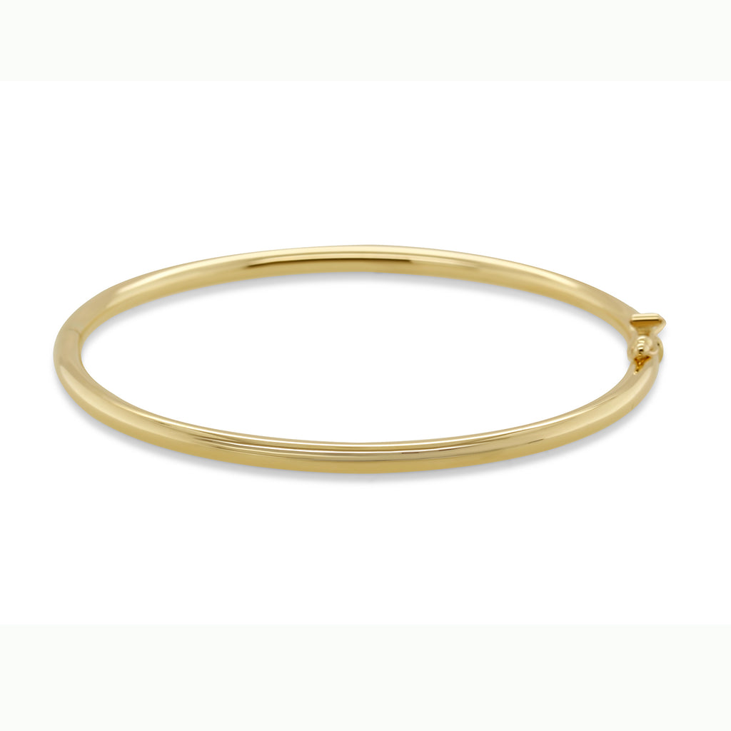 Photograph 1 of 9k Yellow Gold Solid Hinged Bangle. Available on DESIGNYARD.com and in our Jewelry Store Dublin, Ireland. Free Worldwide Shipping with DHL.