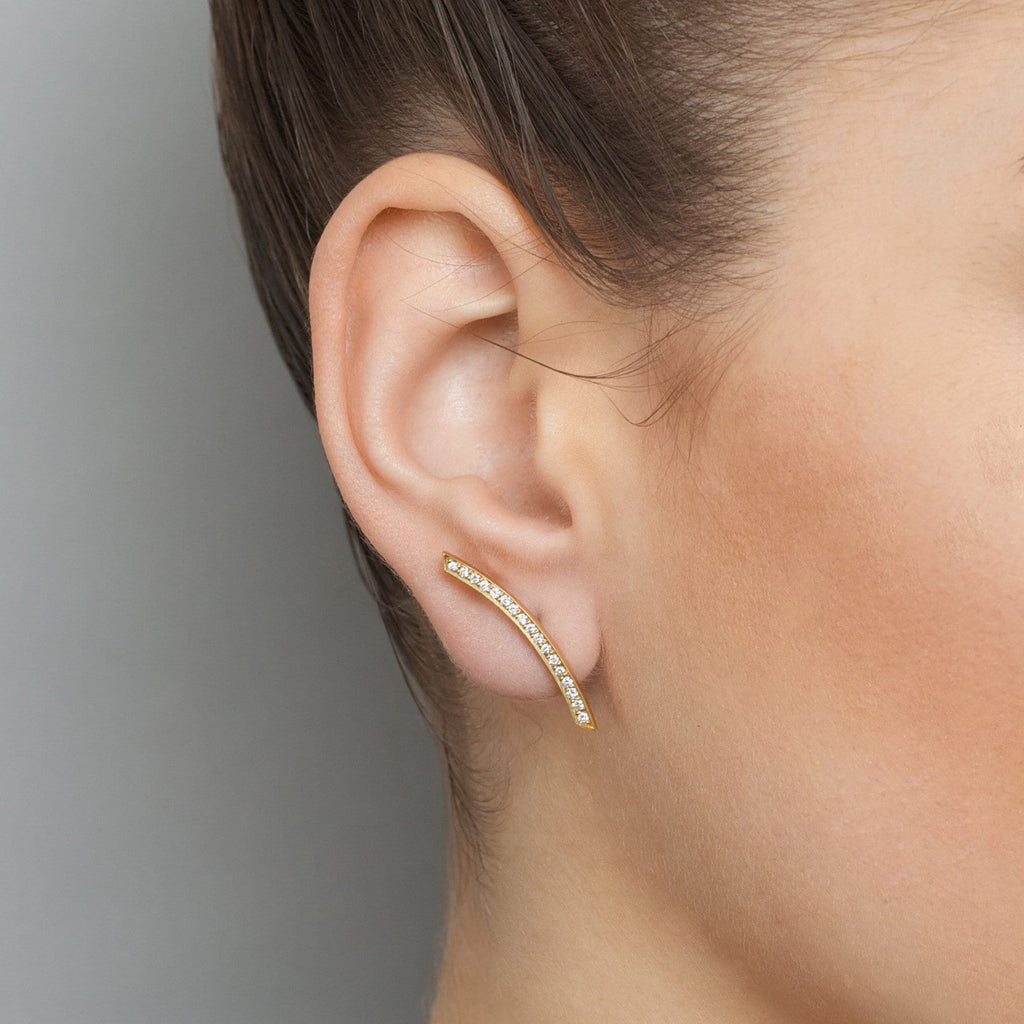 Photograph 2 of Angela Hubel's Contemporary 18k Yellow Gold Diamond Curved Statement Earrings. Available on  DESIGNYARD.com No 1 for Contemporary Jewellery Dublin, Ireland. Free Worldwide Shipping with DHL.