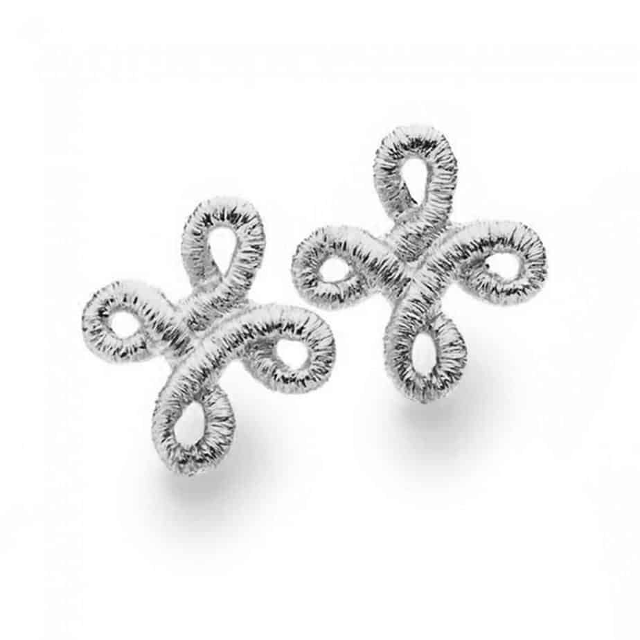 Photograph 1 of Brigitte Adolph's Sterling Silver Pique Dame Stud Dainty Earrings. Available on DESIGNYARD.com #1 for Contemporary Jewellery Dublin, Ireland. Shipping Worldwide.