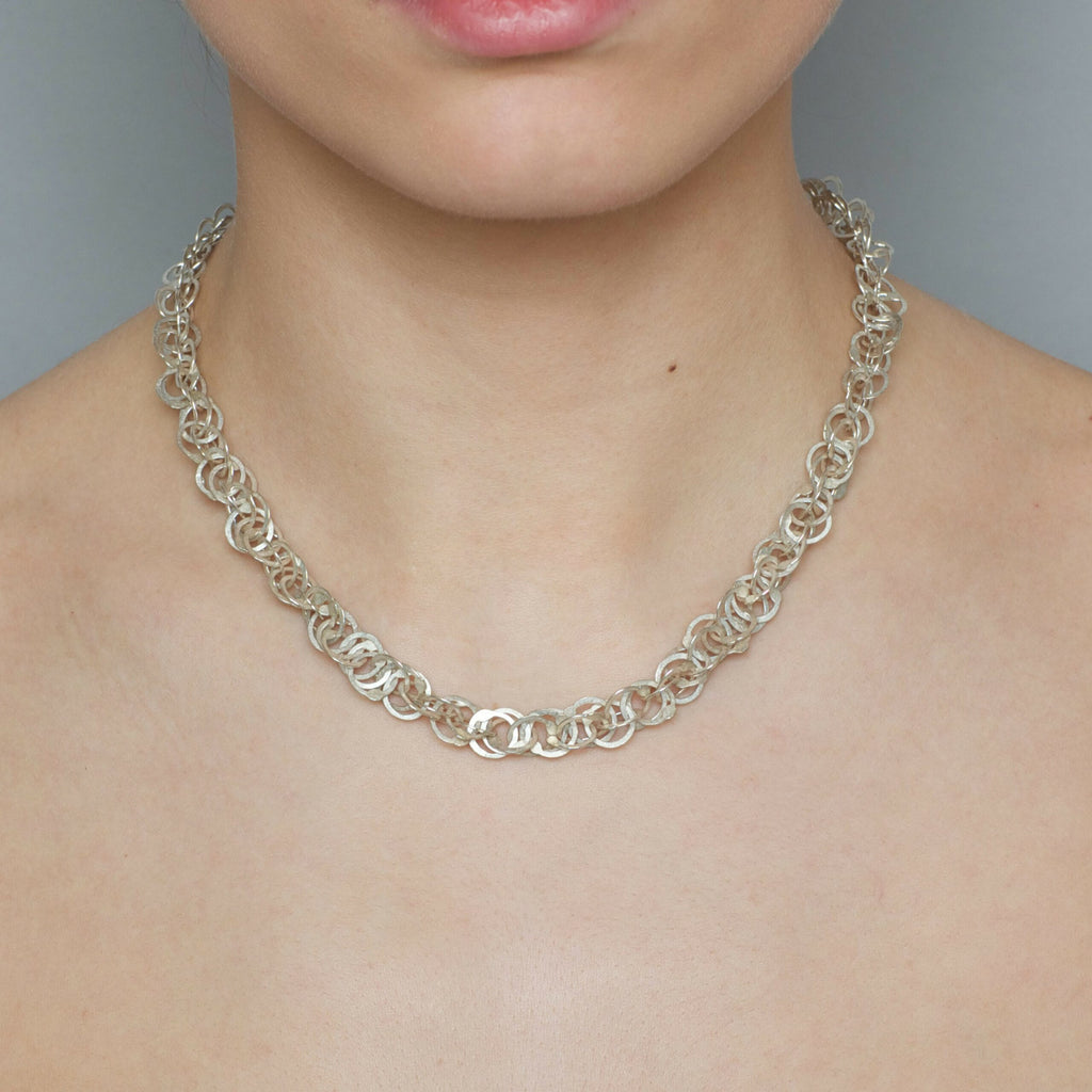 Photograph 3 of Erik Urbschat's Contemporary Sterling Silver Queue S Necklace. Available on DESIGNYARD.com and in our Jewelry Store Dublin, Ireland.