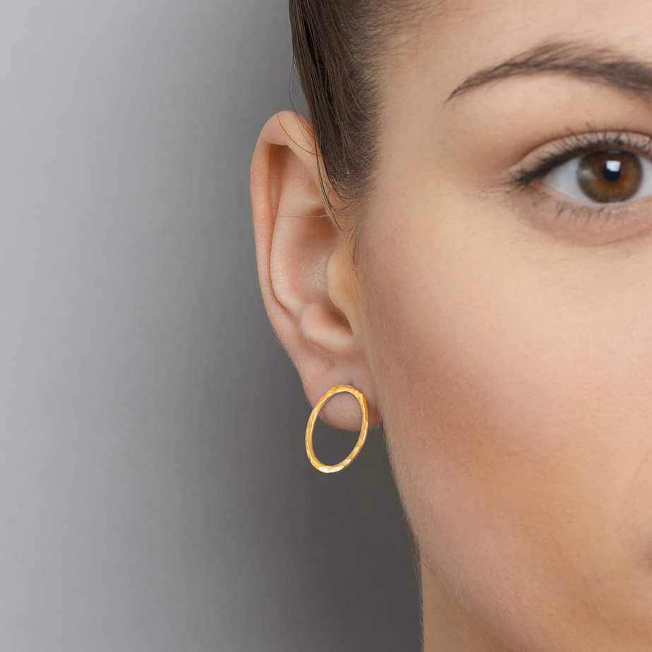 Photograph 2 of Heather O'Connor's Contemporary Silver Yellow Gold Oval Cascade Statement Earrings. Available on DESIGNYARD.com and in our Jewellery Shop Dublin, Ireland.