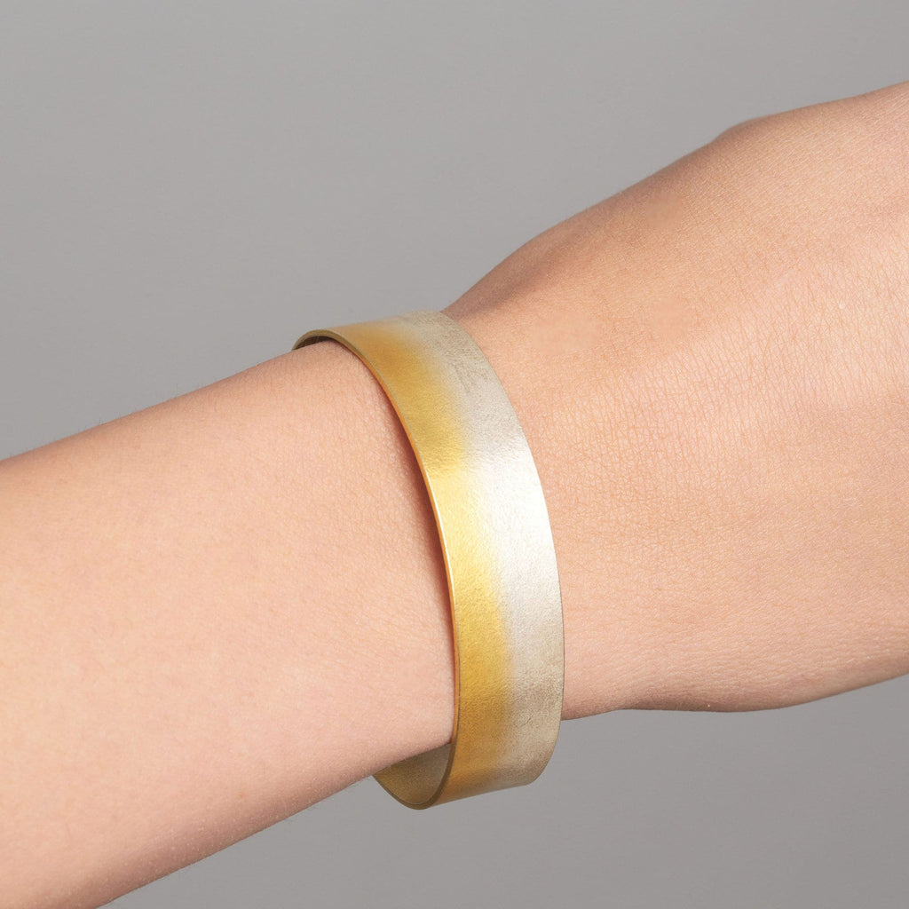 Photograph 2 of Kokkino's Contemporary Electra Slim Yellow Gold Silver Bracelet. Available on DESIGNYARD.com and in our Jewellery Shop Dublin, Ireland. Free Worldwide Shipping with DHL.