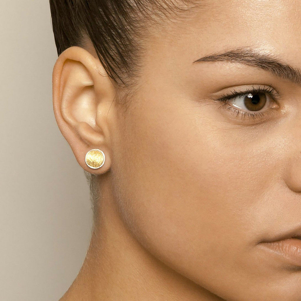 Photograph 2 of Manu's Contemporary Sterling Silver 22k Yellow Gold Bi-Metal Shield Stud Earrings. Available on DESIGNYARD.com and in our Jewellery Shop Dublin, Ireland. Free Worldwide Shipping with DHL.