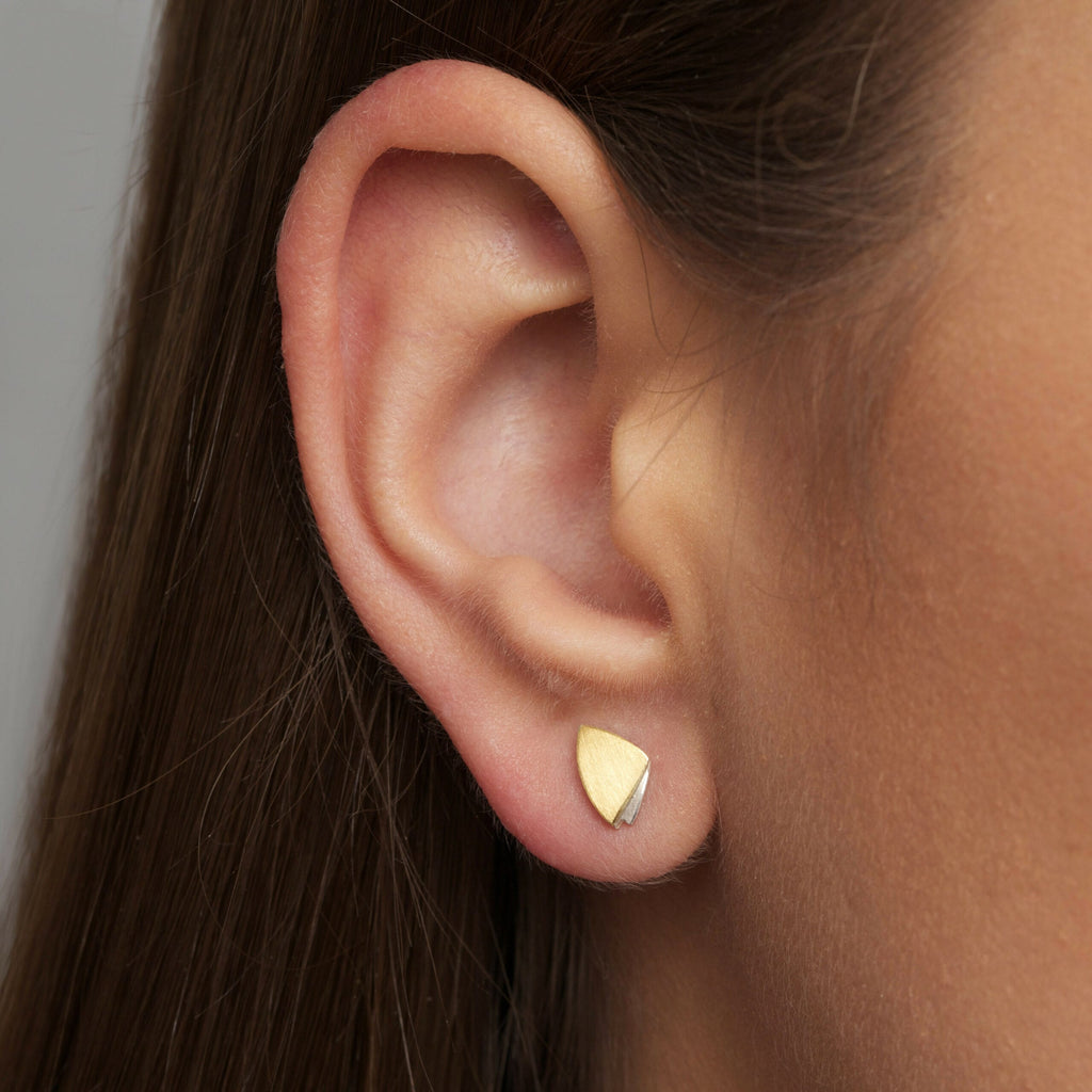 Photograph 2 of Manu's Contemporary Sterling Silver 22k Yellow Gold Bi-Metal Layered Triangle Dainty Stud Earrings. Available on DESIGNYARD.com and in our Jewellery Shop Dublin, Ireland. Free Worldwide Shipping with DHL.