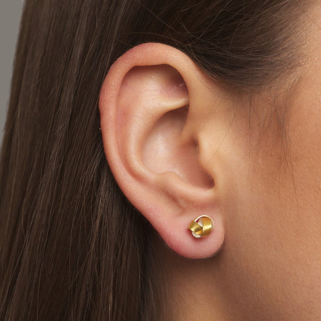 Photograph 2 of Manu's Contemporary Sterling Silver 22k Yellow Gold Bi-Metal Knot Statement Earrings. Available on DESIGNYARD.com and in our Jewellery Shop Dublin, Ireland. Free Worldwide Shipping with DHL.