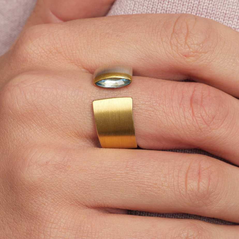Photograph 3 of Manu's Contemporary Sterling Silver 22k Yellow Gold Navette Blue Topaz Open Band Ring. Available on DESIGNYARD.com and in our Jewellery Shop Dublin, Ireland.