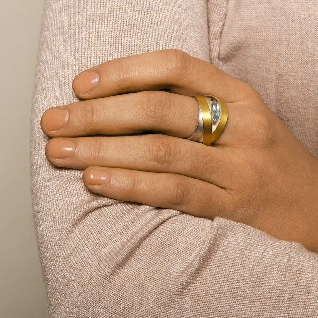 Photograph 2 of Manu's Contemporary Sterling Silver 22k Yellow Gold Topaz Ribbon Ring. Available on DESIGNYARD.com and in our Jewelry Store Dublin, Ireland.
