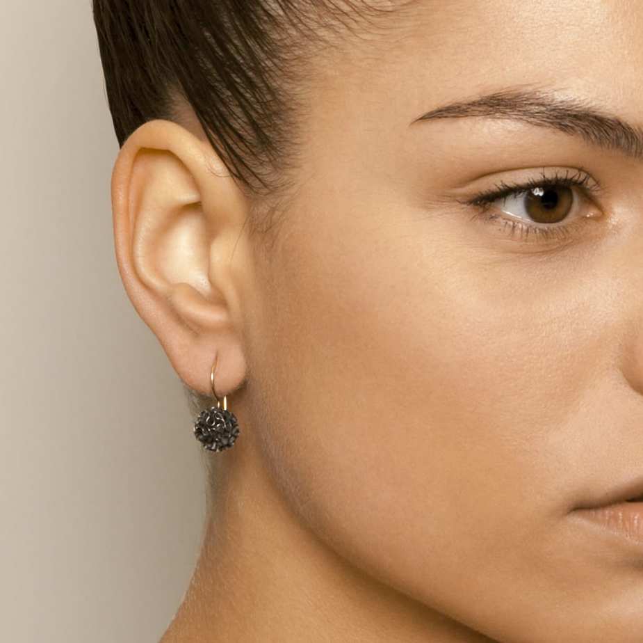 Photograph 2 of Myriam Oude Vrielink's Oxidised Sterling Silver Coral Earrings. Available on DESIGNYARD.com and in our Contemporary Jewellery Shop Dublin, Ireland. Free Worldwide Shipping with DHL.