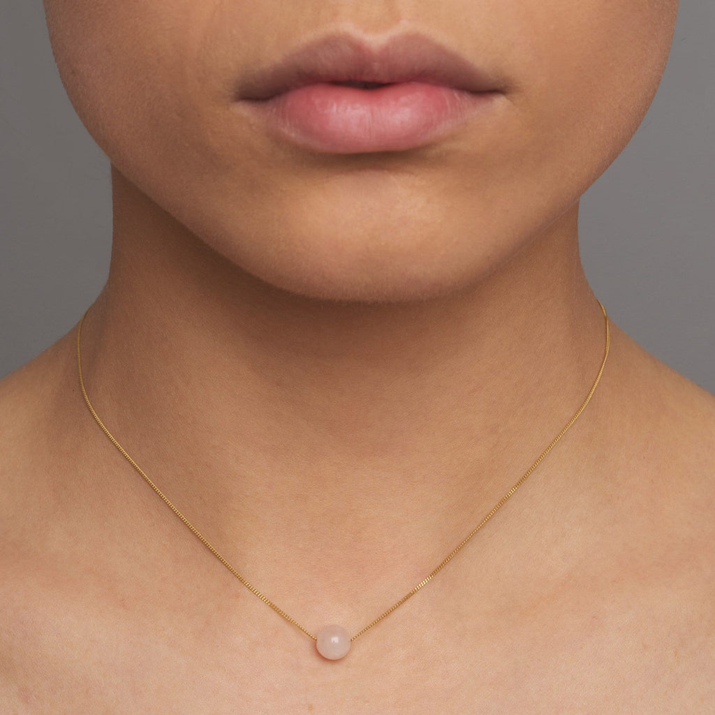 Photograph 2 of Nicole van der Wolf's Dainty 9k Yellow Gold Pink Beryl Necklace. Available on DESIGNYARD.com and in our Jewellery Shop Dublin, Ireland. Free Worldwide Shipping with DHL.