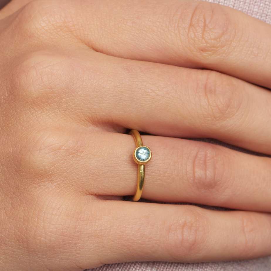 Photograph 3 of Shimara Carlow's Contemporary 18k Yellow Gold Gum Nut Solitaire Aquamarine Alternative Engagement Ring. Available on DESIGNYARD.com and in our Jewellery Shop Dublin, Ireland. Free Worldwide Shipping with DHL.