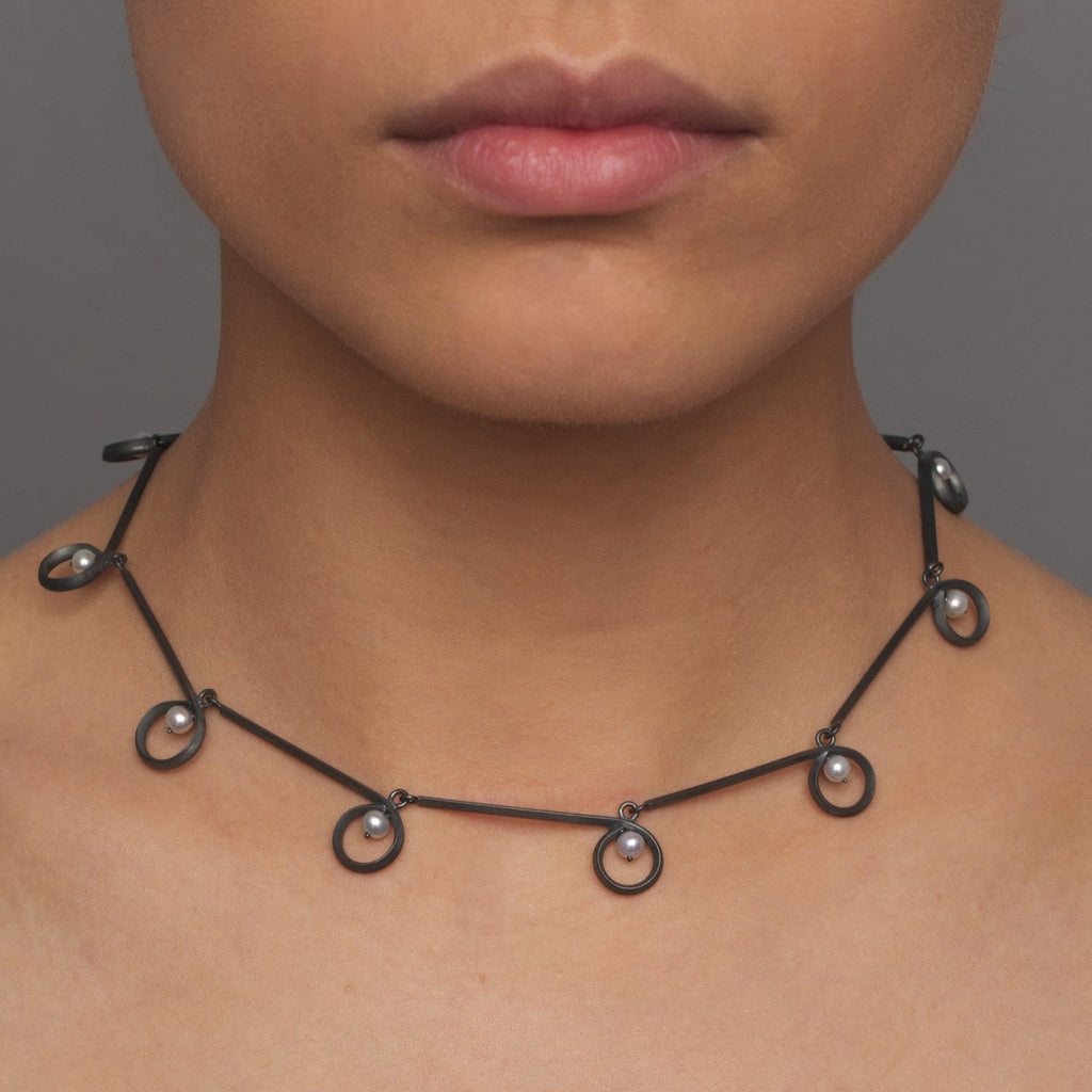 Photograph 2 of Sophia Epp's Contemporary Oxidized Silver Freshwater Pearl Kreise Statement Necklace. Available on DESIGNYARD.com and in our Jewellery Shop Dublin, Ireland.