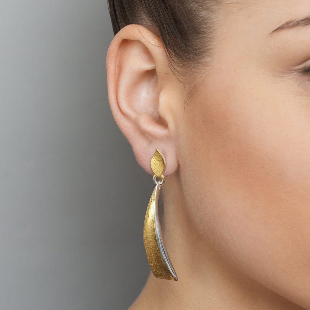 Photograph 3 of Seamus Gill's Contemporary 22k Yellow Gold Silver Flowing Curves Long Blade Statement Earrings. Available on DESIGNYARD.com and in our Jewellery Shop Dublin, Ireland. Worldwide Shipping with DHL.