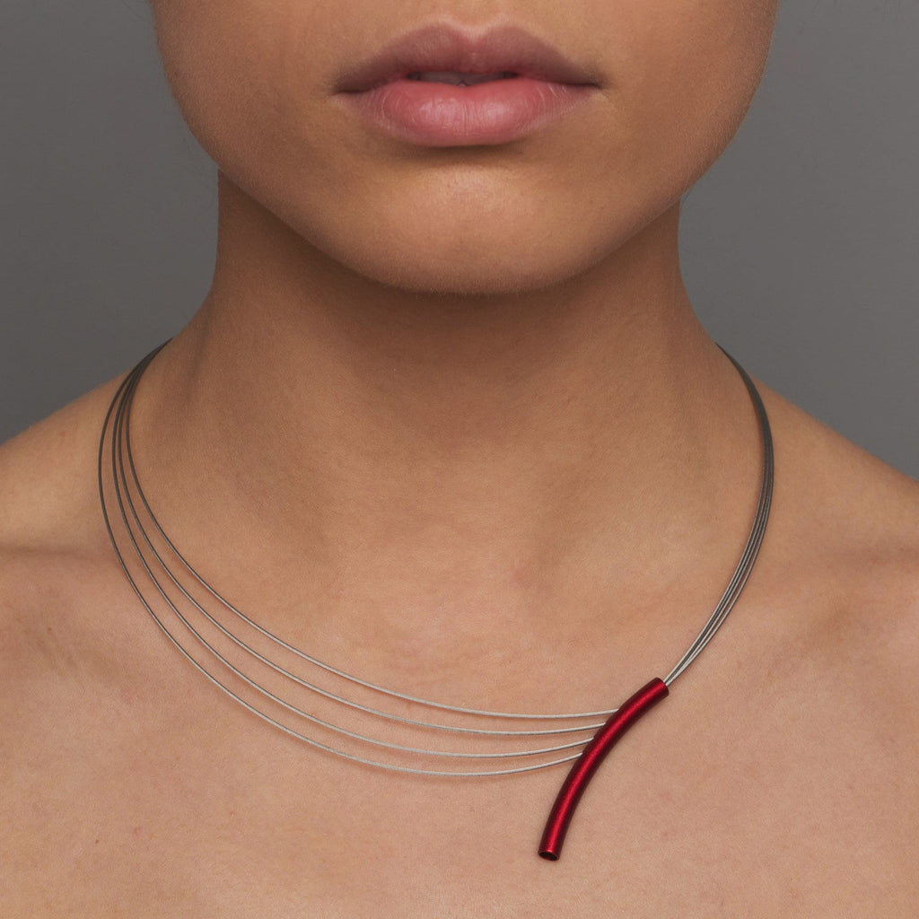Ursula Muller - Red Stainless Steel Curved Tube Necklace - DESIGNYARD, Dublin Ireland.