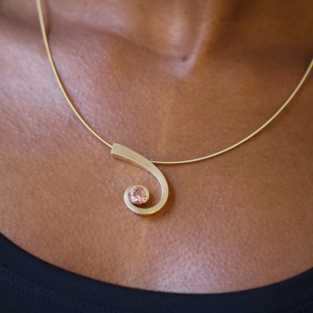 Photograph 2 of Angela Hubel's Contemporary 18k Rose Gold Brown Zircon Shooting Star Statement Necklace. Available on DESIGNYARD.com and in our Jewellery Shop Dublin, Ireland. Free Worldwide Shipping with DHL. 