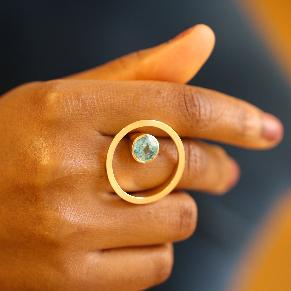 Photograph 5 of Angela Hubel's Contemporary 18k Rose Gold Treasure Island Blue Zircon Statement Ring. Available on DESIGNYARD.com No. 1 for Contemporary Jewellery Dublin, Ireland. Free Worldwide Shipping with DHL.