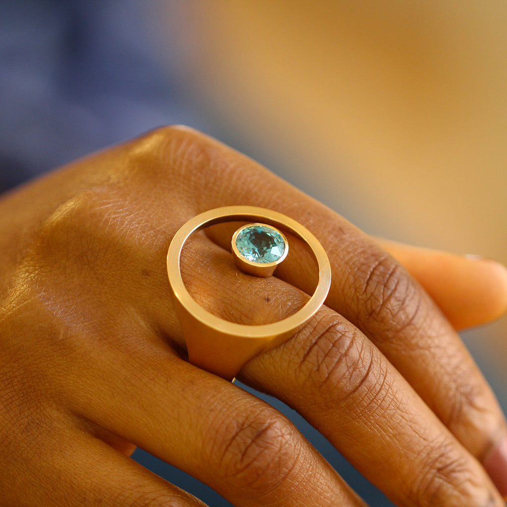Photograph 4 of Angela Hubel's Contemporary 18k Rose Gold Treasure Island Blue Zircon Statement Ring. Available on DESIGNYARD.com No. 1 for Contemporary Jewellery Dublin, Ireland. Free Worldwide Shipping with DHL.