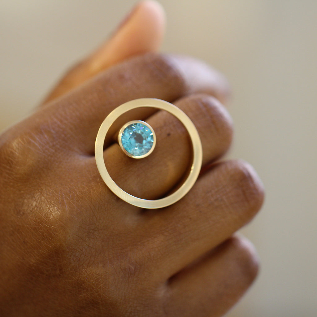 Photograph 3 of Angela Hubel's Contemporary 18k Rose Gold Treasure Island Blue Zircon Statement Ring. Available on DESIGNYARD.com No. 1 for Contemporary Jewellery Dublin, Ireland. Free Worldwide Shipping with DHL.