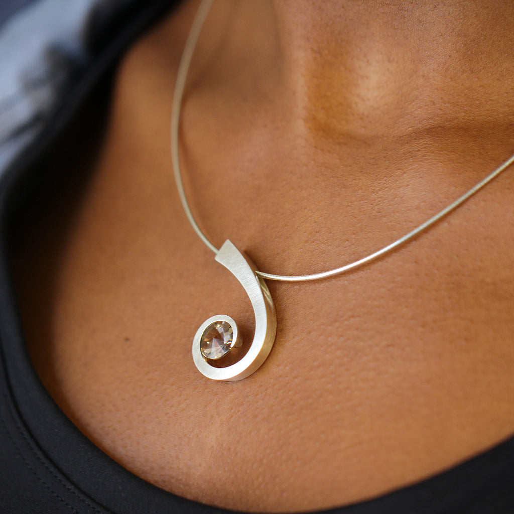 Photograph 2 of Angela Hubel's Sterling Silver Laguna Smokey Quartz Necklace. Available on DESIGNYARD.com and in our Jewelry Store Dublin, Ireland. Free Worldwide Shipping with DHL.