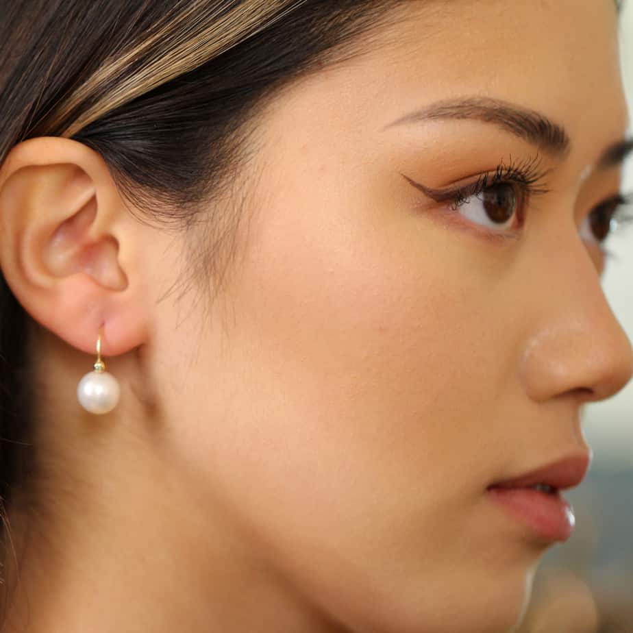 Photograph 3 of Cassie McCann's 18k Yellow Gold Green Diamond Pearl Anu Drop Earrings, available on DESIGNYARD.com and in store Dublin Ireland. Free Worldwide Shipping with DHL.
