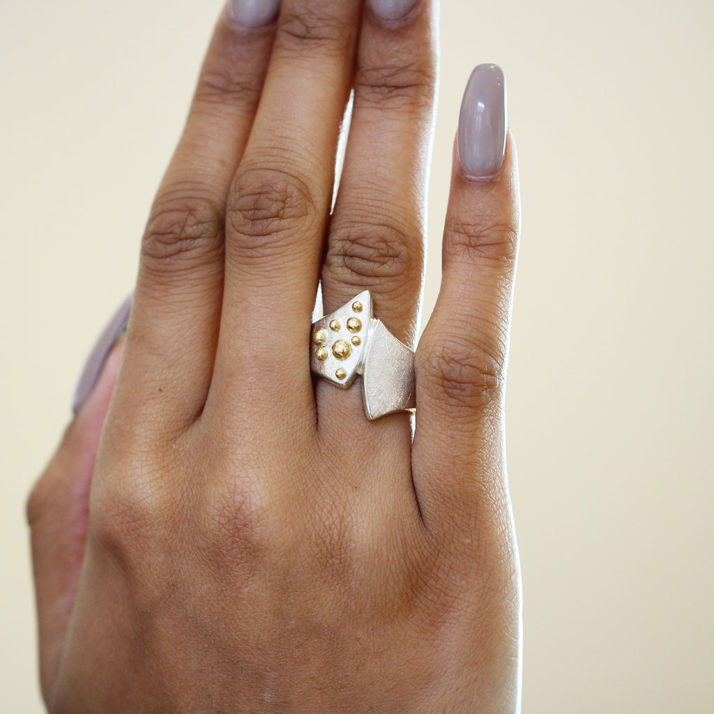 Photograph 2 of Cassie McCann's 18k Yellow Gold Sterling Silver Sea Fizz Statement Ring. Available on DESIGNYARD.com No 1 for Contemporary Jewellery Dublin Ireland.