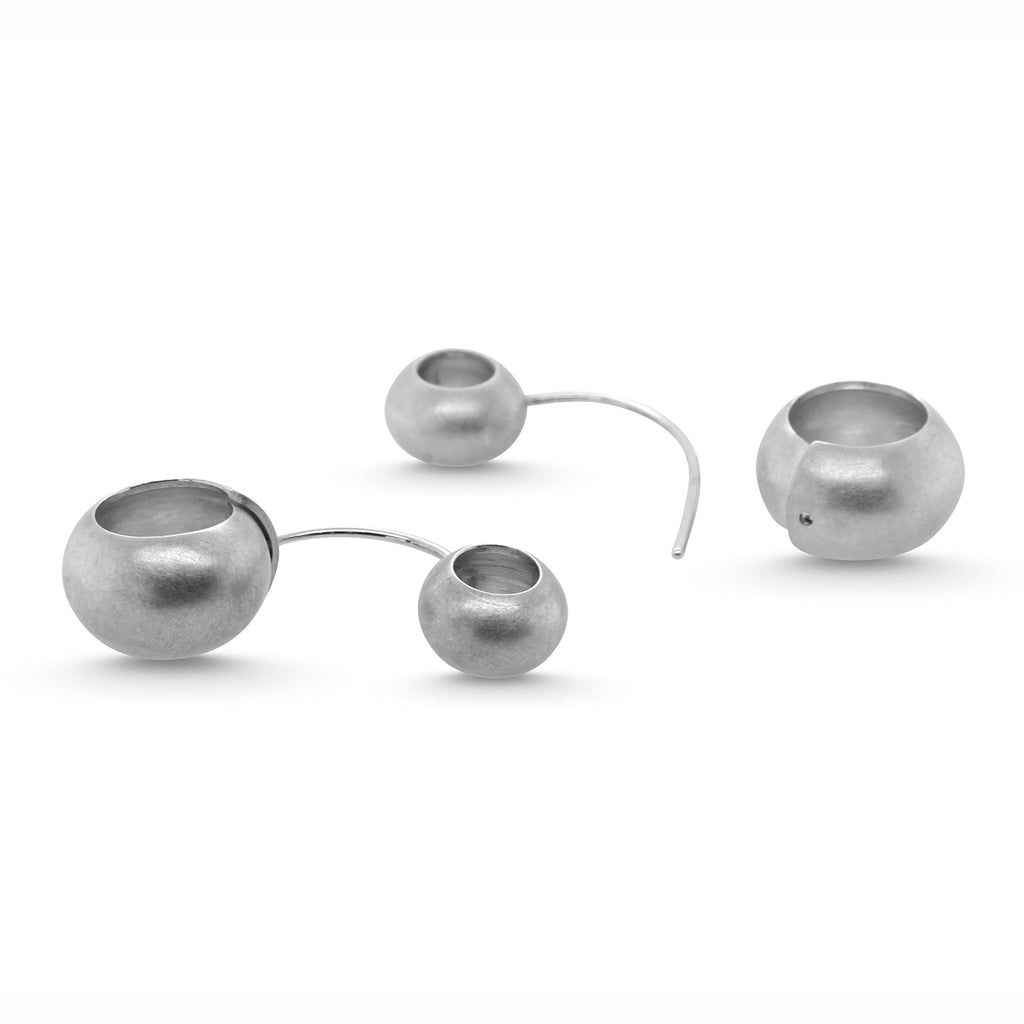Photograph 2 of Erik Urbschat's Contemporary Sterling Silver Lupo Statement Earrings. Available on DESIGNYARD.com and in our Jewelry Store Dublin, Ireland.
