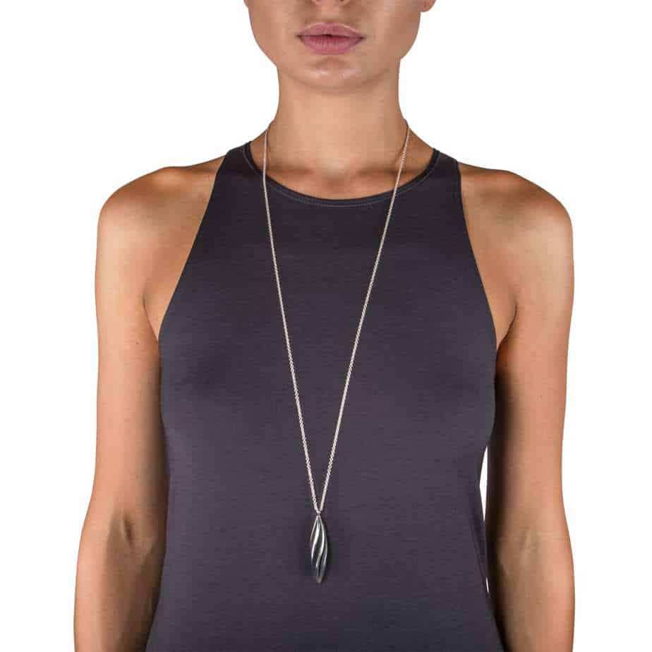 Photograph 2 of Sarah Herriot's Contemporary Silver Oxidised Beat Twist Statement Pendant. Available on DESIGNYARD.com and in our Jewellery Shop Dublin, Ireland. Free Worldwide Shipping with DHL.