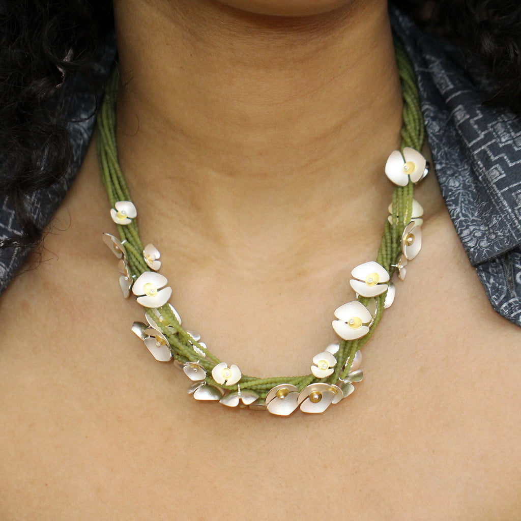 Photograph 3 of Inga Reed's Contemporary Silver 22k Yellow Gold Serpentine Orchid Statement Neckpiece. Available on DESIGNYARD.com and in our Jewelry Store Dublin, Ireland.