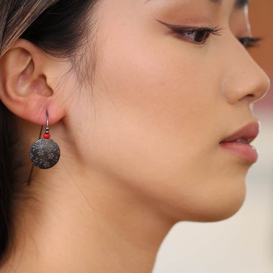 Jane Moore - Sterling Silver Oxidised Red Glass Embossed Flower Earrings - DESIGNYARD, Dublin Ireland.