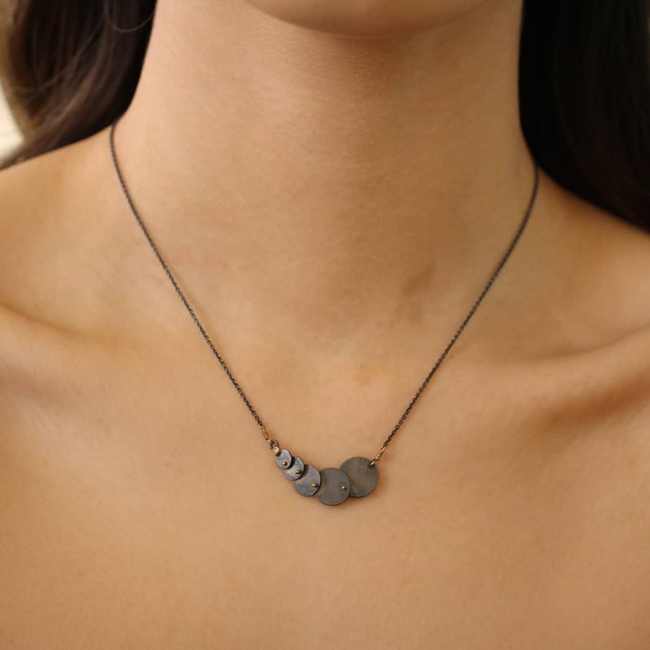 Photograph 2 of Bergsøe's Organic 18k Yellow Gold Oxidised Silver Mermaid Diamond Necklace. Available on DESIGNYARD.com and in our Jewellery Shop Dublin, Ireland. Free Worldwide Shipping with DHL.