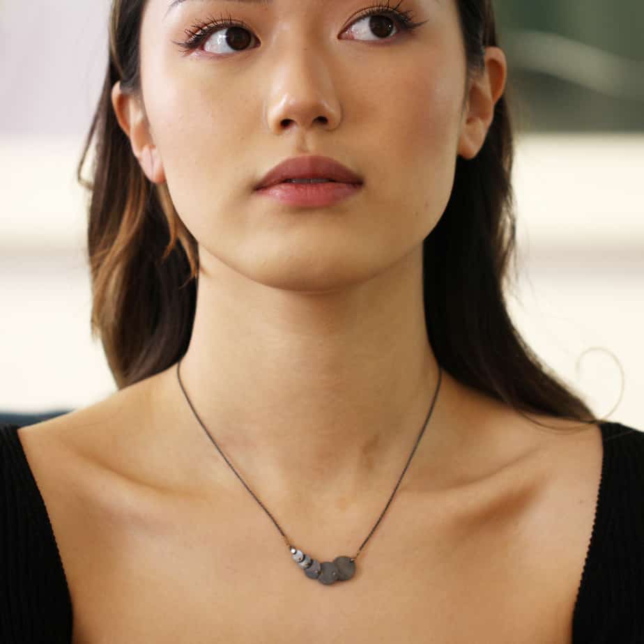 Photograph 3 of Bergsøe's Organic 18k Yellow Gold Oxidised Silver Mermaid Diamond Necklace. Available on DESIGNYARD.com and in our Jewellery Shop Dublin, Ireland. Free Worldwide Shipping with DHL.