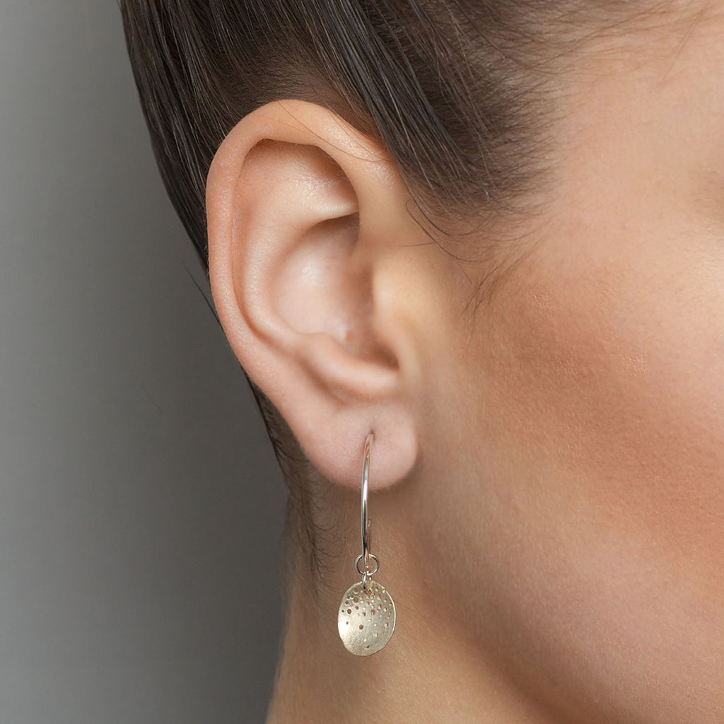 Photograph 2 of Kate Smith's Contemporary 9k Yellow Gold Oval Silver Hoop Earrings. Available on DESIGNYARD.com and in our Jewellery Shop Dublin, Ireland. Free Worldwide Shipping with DHL.