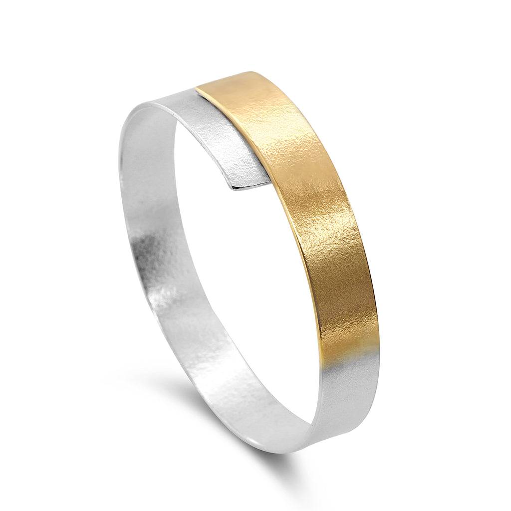 Photograph 1 of Kokkino's Contemporary Electra Overlap Gold Plated Silver Bracelet. Available on  DESIGNYARD.com and in our Jewellery Shop Dublin Ireland. Free Worldwide Shipping with DHL.