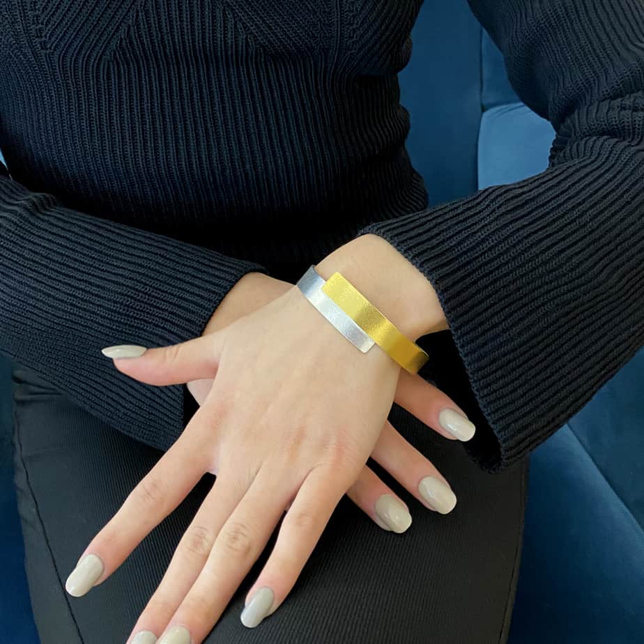 Photograph 2 of Kokkino's Contemporary Electra Overlap Gold Plated Silver Bracelet. Available on  DESIGNYARD.com and in our Jewellery Shop Dublin Ireland. Free Worldwide Shipping with DHL.