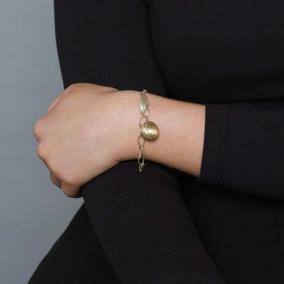 Photograph 2 of Kate Smith's Contemporary Yellow Gold Silver Pod Bracelet. Available on DESIGNYARD.com and in our Jewellery Shop Dublin, Ireland. Free Worldwide Shipping with DHL.
