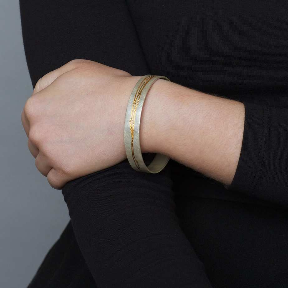 Photograph 3 of Kate Smith's Contemporary Sterling Silver Wide Etched Bangle. Available on DESIGNYARD.com and in our Jewellery Shop Dublin, Ireland. Free Worldwide Shipping with DHL.