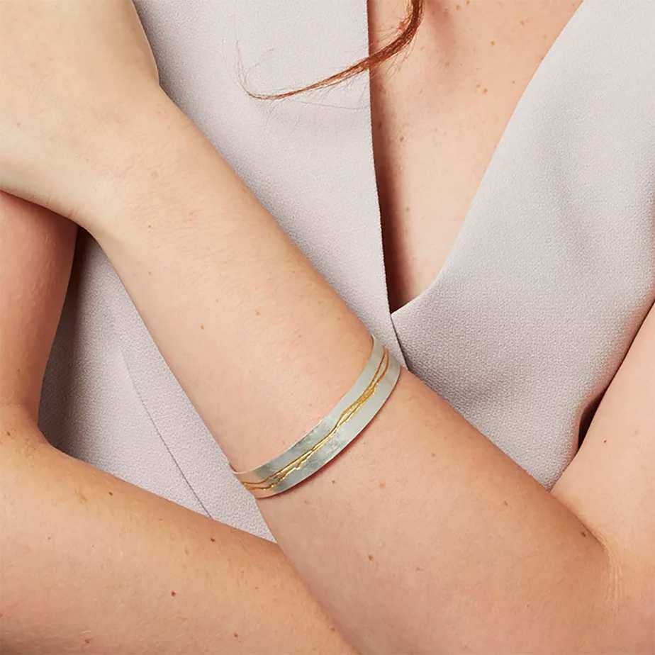 Photograph 2 of Kate Smith's Contemporary Sterling Silver Wide Etched Bangle. Available on DESIGNYARD.com and in our Jewellery Shop Dublin, Ireland. Free Worldwide Shipping with DHL.