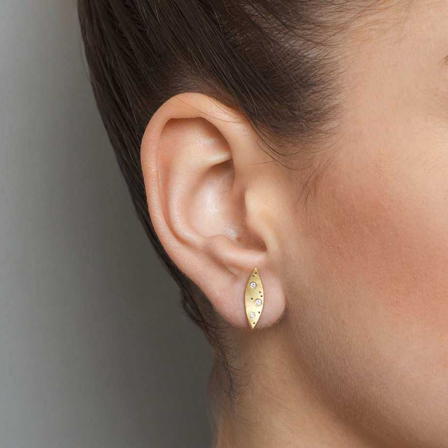Photograph 2 of Kate Smith's Contemporary 18k Yellow Gold Spotty Leaf Diamond Statement Earrings. Available on DESIGNYARD.com and in our Jewellery Shop Dublin, Ireland. Free Worldwide Shipping with DHL.