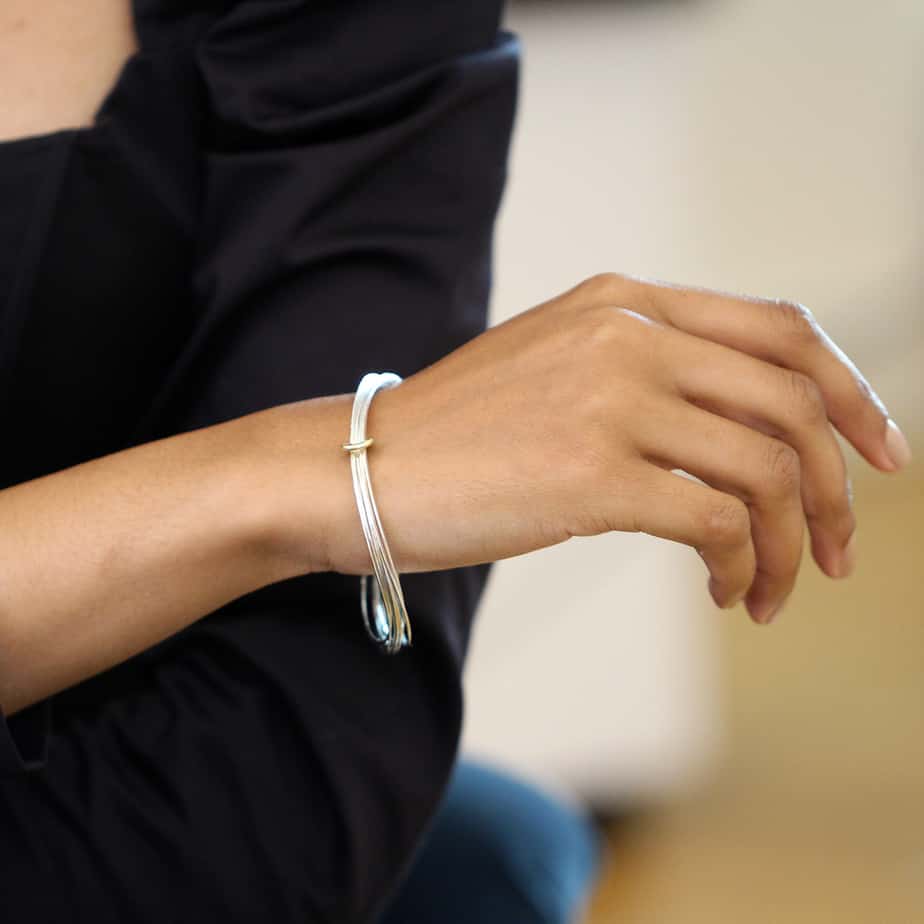 Photograph 2 of Latham & Neve's Contemporary Sterling Silver 18k Yellow Gold Total Honesty Bangle. Available on DESIGNYARD.com and in our Jewellery Shop Dublin, Ireland. Free Worldwide Shipping with DHL.