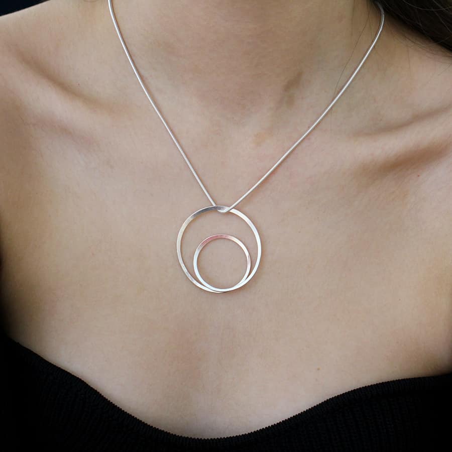 Photograph 3 of Latham & Neve's Contemporary Sterling Silver Gyra Pendant. Available on DESIGNYARD.com and in our Jewellery Shop Dublin, Ireland. Worldwide Shipping with DHL.