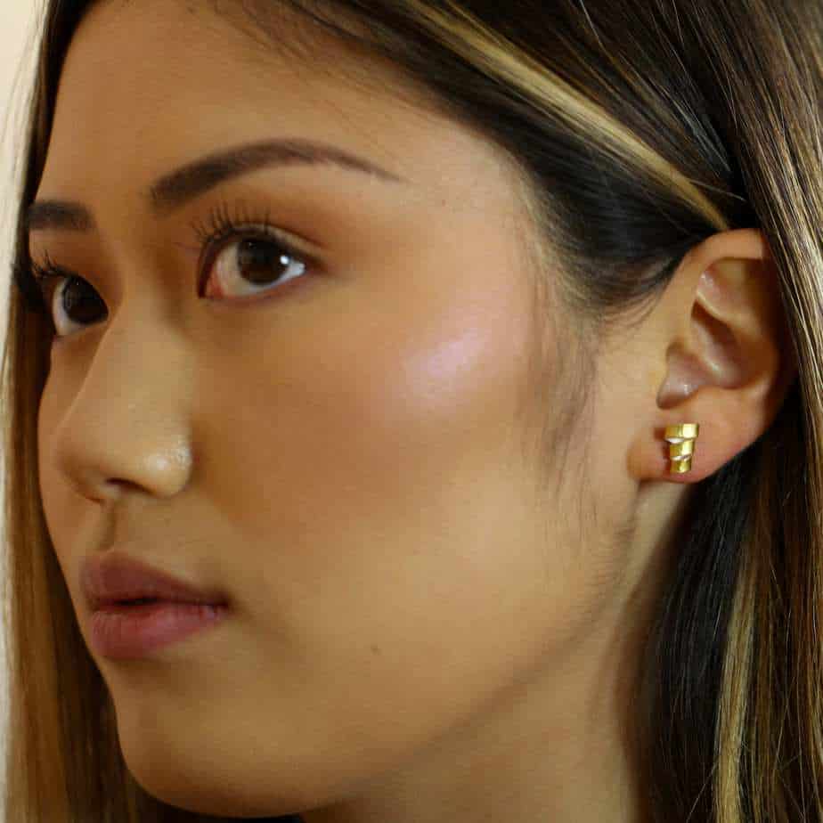 Photograph 2 of Manu's Contemporary Sterling Silver 22k Yellow Gold Bi-Metal Guggenheim Statement Earrings. Available on DESIGNYARD.com and in our Jewellery Shop Dublin, Ireland. Free Worldwide Shipping with DHL.