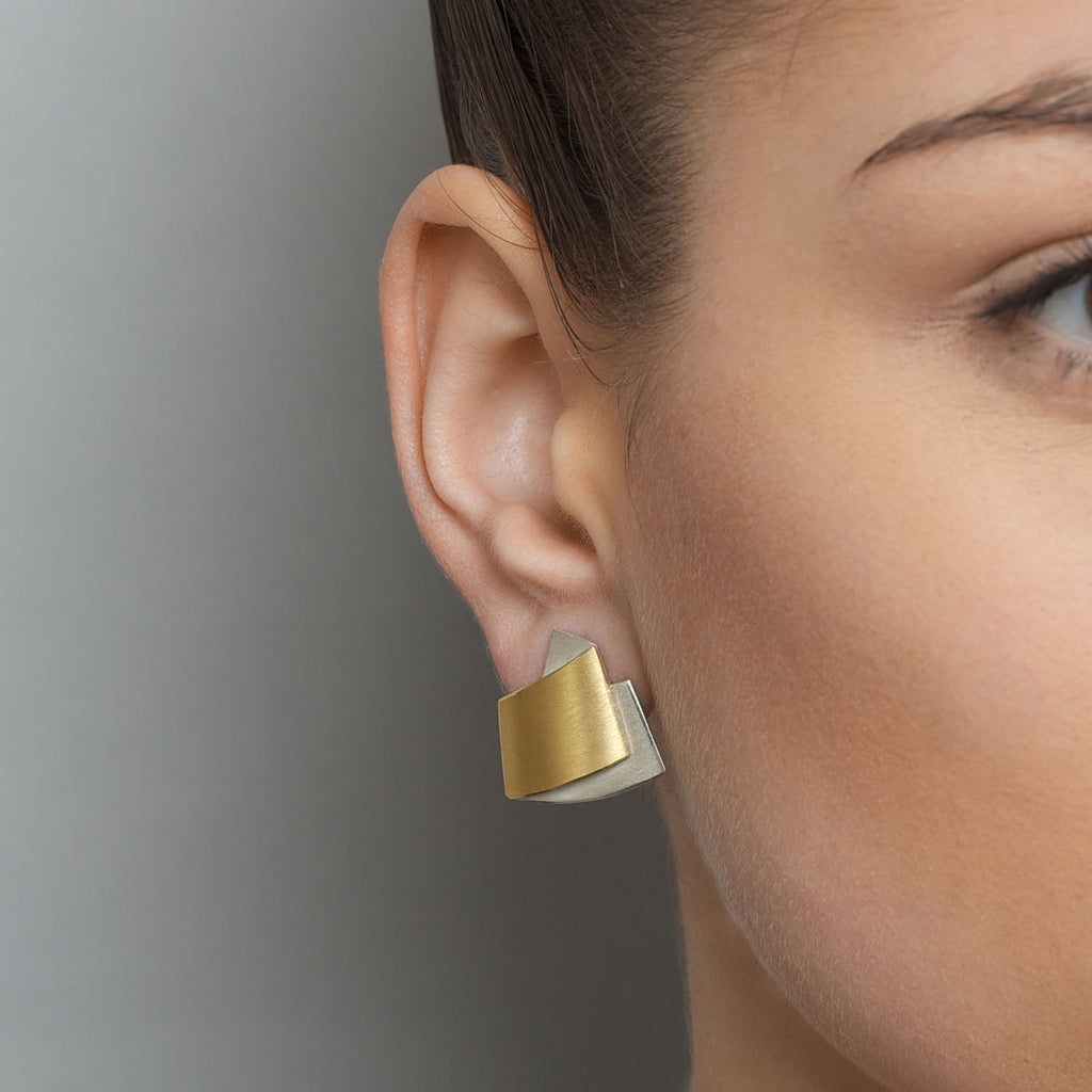 Photograph 2 of Manu's Contemporary Sterling Silver 22k Yellow Gold Clip-on Statement Earrings. Available on DESIGNYARD.com and in our Jewellery Shop Dublin, Ireland. Free Worldwide Shipping with DHL.